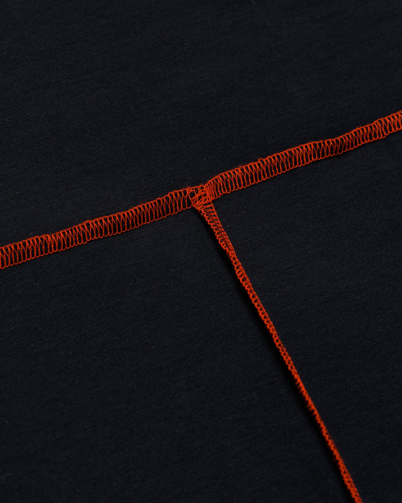 Outnback Bog Tee contrast orange seam stitching detail