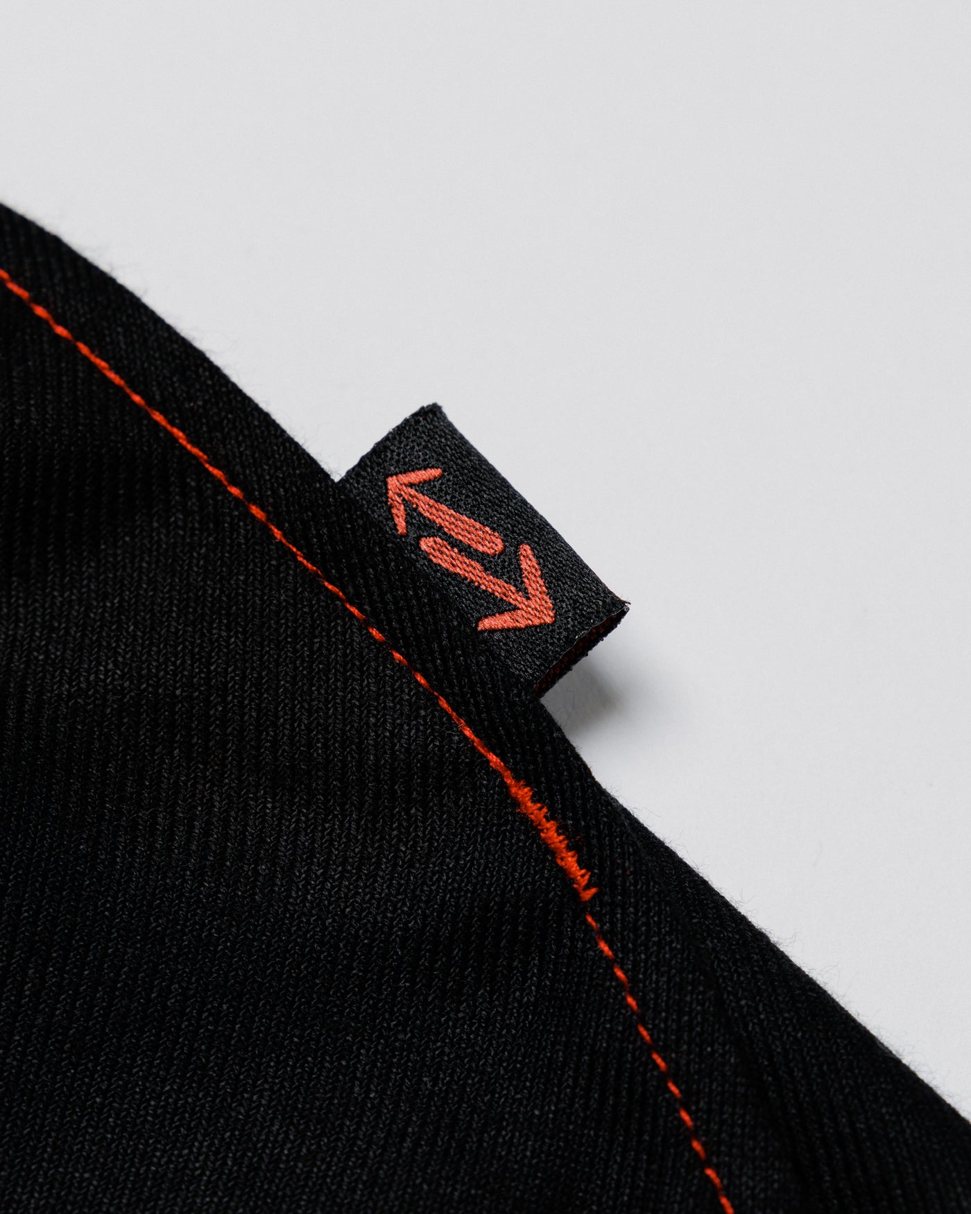 Outnback Running Short in black, woven logo label detail