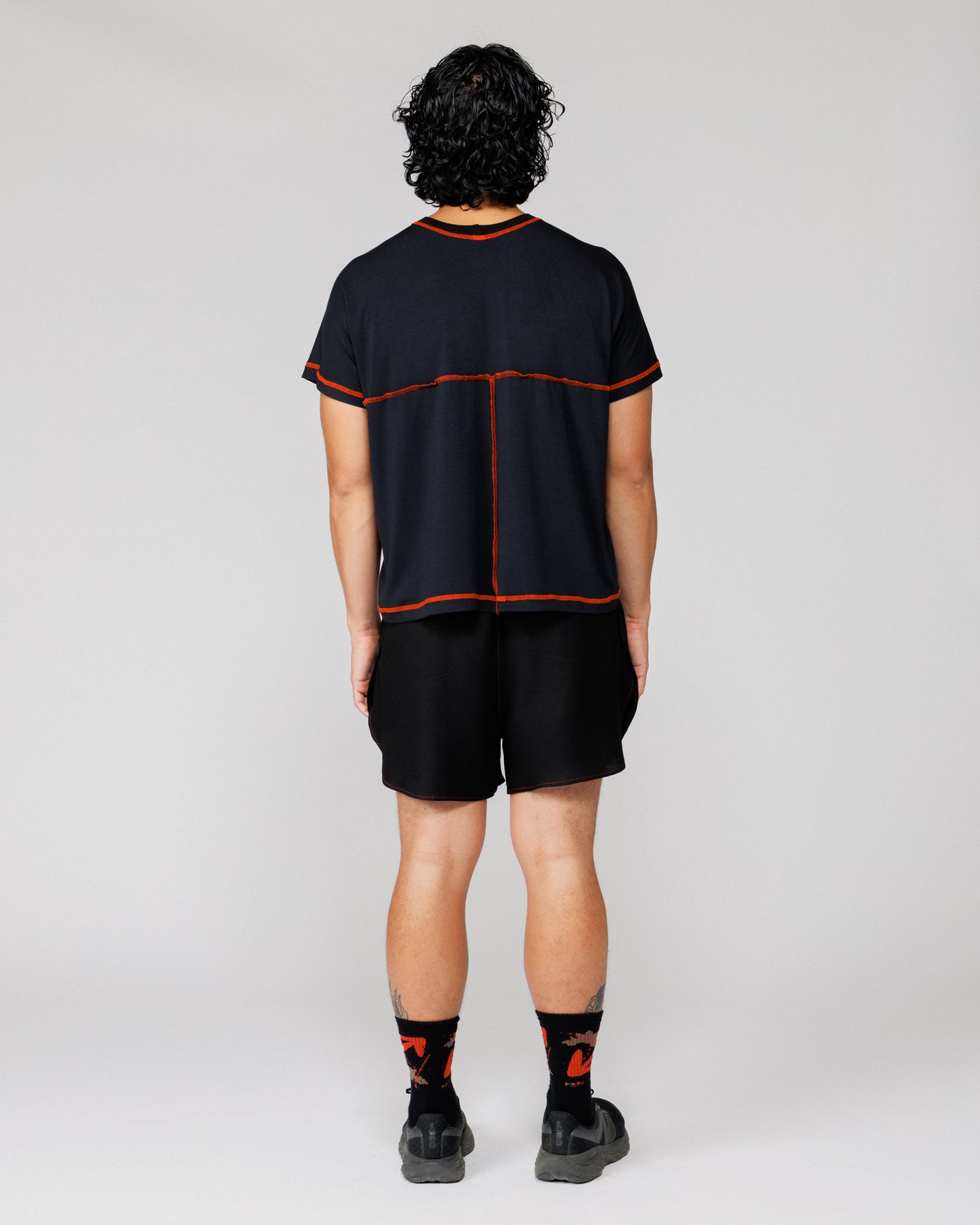 Outnback Running Short in black, back view on model