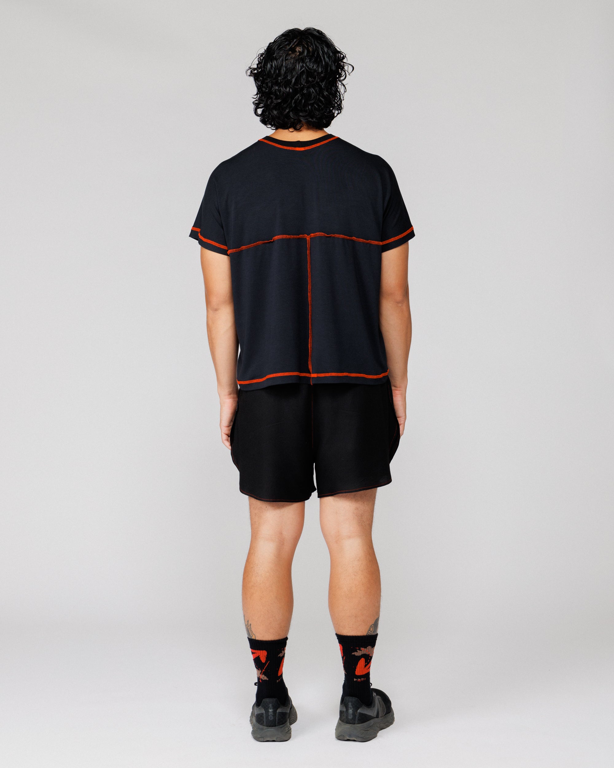 Outnback Running Short in black, back view on model