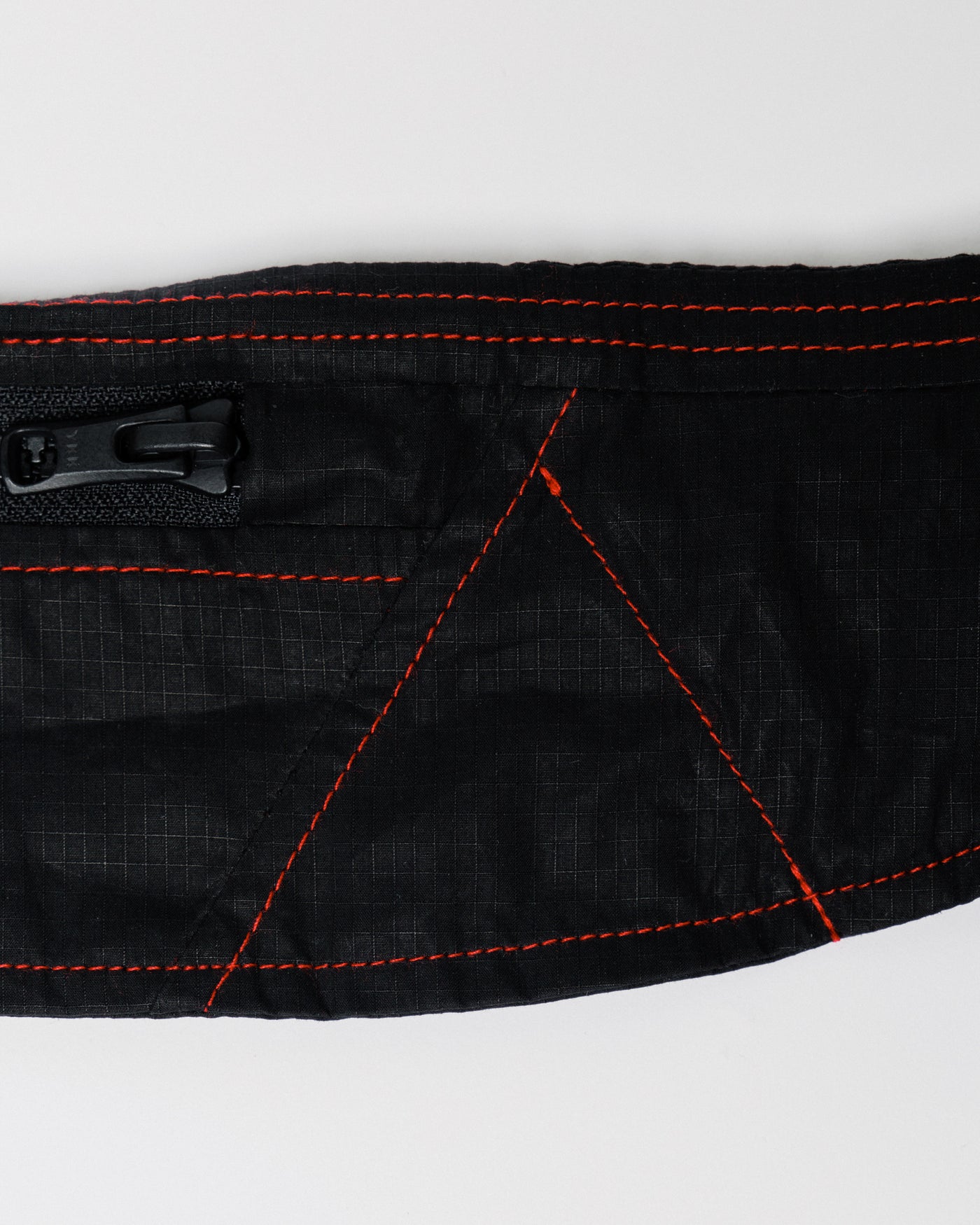 Outnback Running Strap in black, red contrast stitching detail